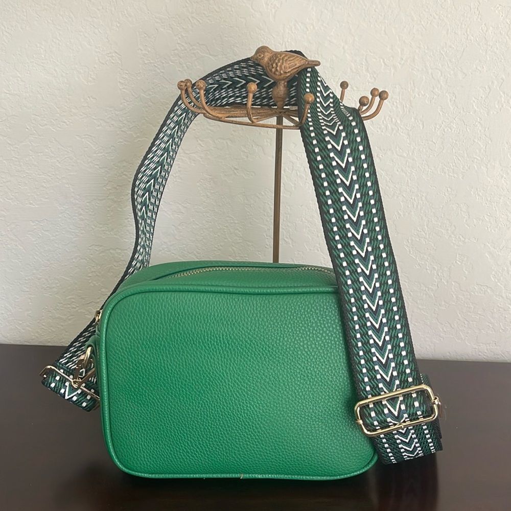Green Ah-Dorned crossbody handbag.